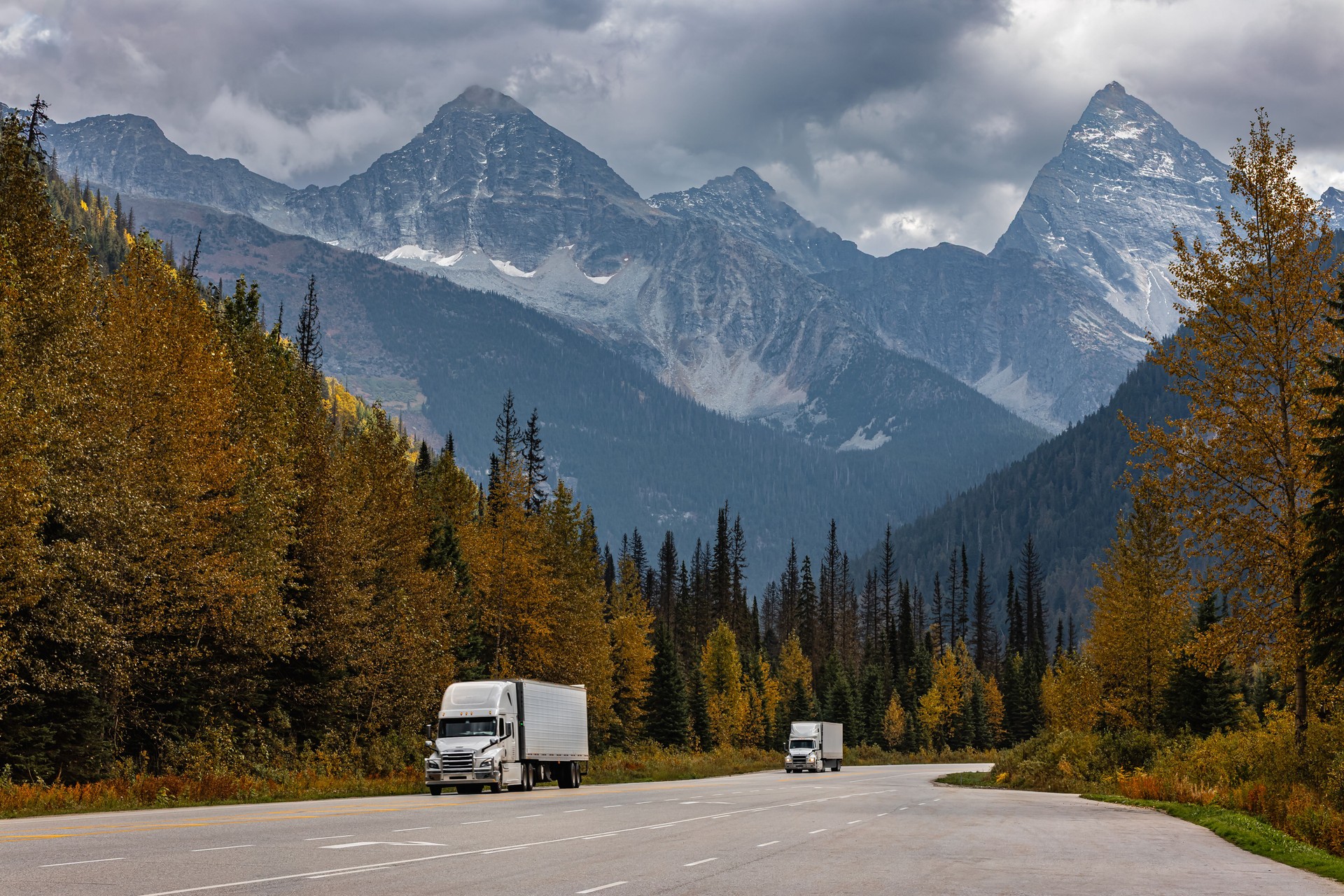 Scenic road in the Canadian Rockies in cloudy cold day Alberta, Canada.